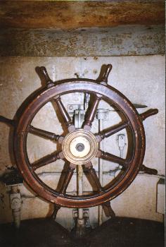 The wheel inside the conning tower on the cruiser Olympia