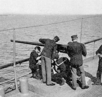 Marines man a 6-pounder gun aboard the U.S.S. Yankee